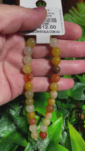 Load and play video in Gallery viewer, Grapefruit Agate Natural Crystal Wristlet
